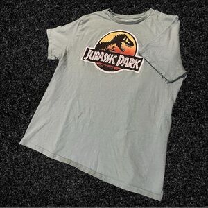 Jurassic Park Tropical style Graphic Logo on Light Blue/Teal Tee